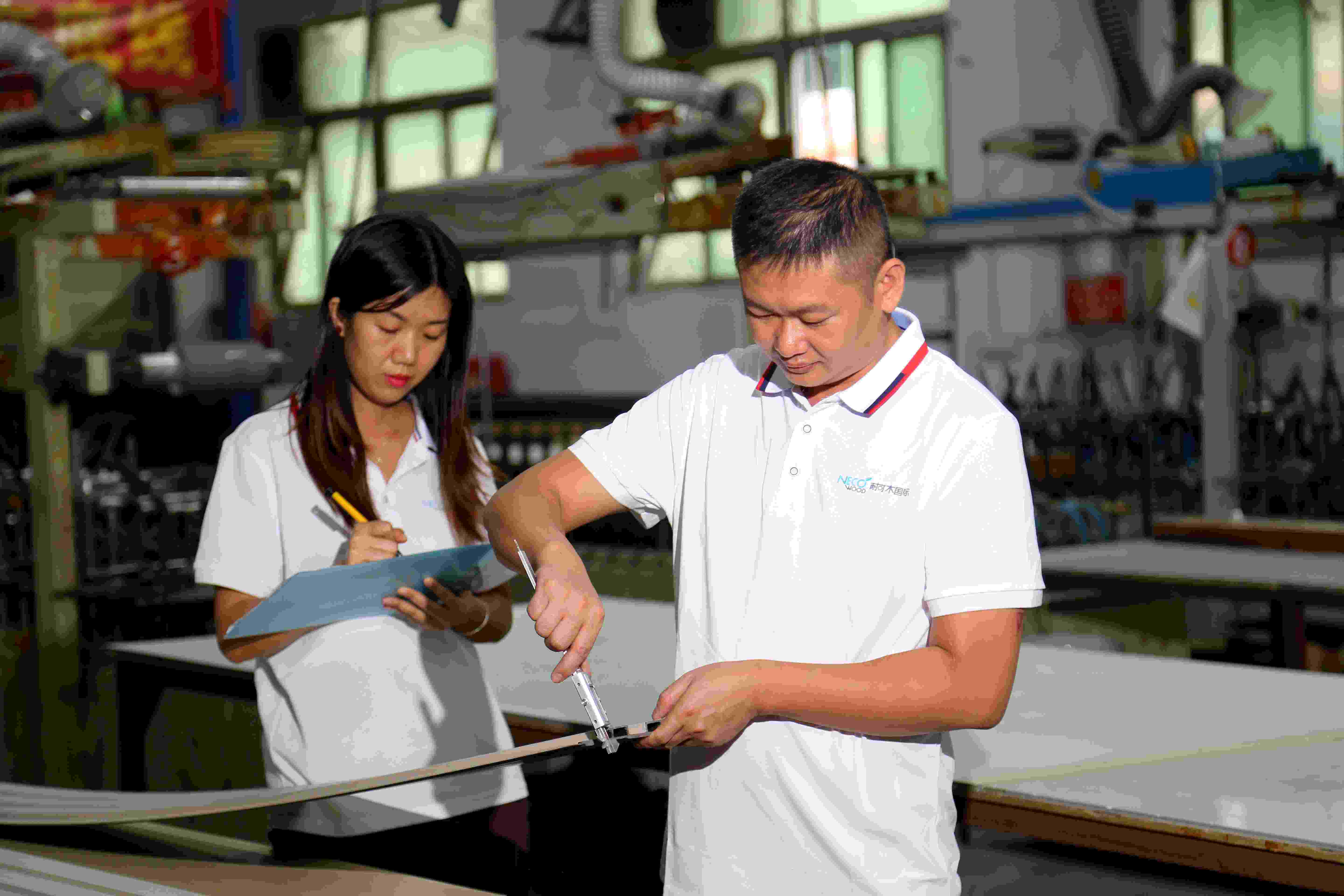 WPC wall panel factory production line and quality control in China – Necowood facility